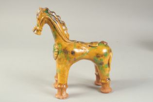 A TURKISH CANAKKALE POTTERY HORSE, 22cm long.