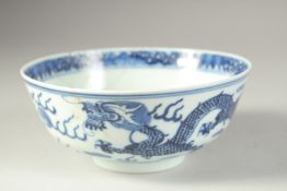 A CHINESE BLUE AND WHITE PORCELAIN DRAGON BOWL, the base with character mark, 15.5cm diameter, (
