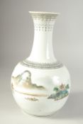 A CHINESE REPUBLIC PORCELAIN VASE, painted with a landscape scene, with red character mark to