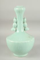 A CHINESE CELADON GLAZED TWIN HANDLE VASE, with lotus root design, character mark to base, 34cm
