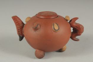 A SMALL CHINESE YIXING TEAPOT, 12cm spout to handle.