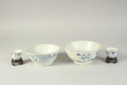 TWO CHINESE TEK SING CARGO BLUE AND WHITE PORCELAIN BOWLS, 15cm and 16cm diameter, together with two
