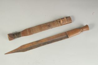 AN AFRICAN WOODEN DAGGER, 43cm long.