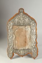 AN 18TH CENTURY OTTOMAN TURKISH EMBOSSED SILVER MOUNTED FRAME.