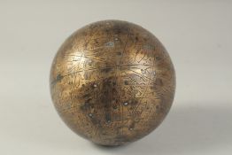 A SILVER INLAID BRASS CELESTIAL GLOBE, decorated with the 48 constellations and inscribed with their