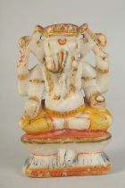 A 19TH CENTURY CARVED ALABASTER GANESH, with painted decorations and gilt highlights, 16cm high.