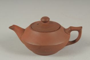 A SMALL CHINESE YIXING TEAPOT, 11.5cm spout to handle.