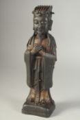 A FINE CHINESE BRONZE FIGURE, with traces of gilding, 29cm high.
