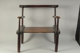 A CARVED HARDWOOD LOW CHAIR, 59cm wide.