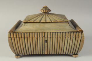 AN ANTIQUE ANGLO INDIAN BUFFALO HORN MOUNTED SEWING BOX, the interior with ebonised lidded