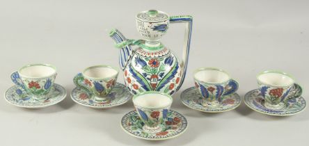 A FINE 19TH CENTURY IZNIK STYLE CANTAGALLI POTTERY COFFEE SET, comprising coffee pot, and five