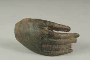 AN EARLY BRONZE HAND FRAGMENT, possibly Thai, 13.5cm long.