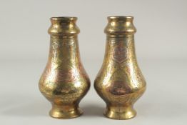 A PAIR OF LATE 19TH-EARLY 20TH CENTURY SYRIAN DAMASCUS CAIROWARE SILVER AND COPPER INLAID VASES,