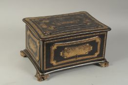 A FINE CHINOISERIE GILDED BLACK LACQUER SMOKER'S CABINET, with metal lined compartment and cigar