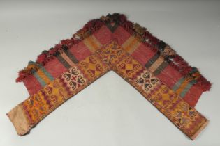 A VERY FINE 19TH CENTURY CENTRAL ASIAN EMBROIDERED HORSE COLLAR TEXTILE, with white metal beads.