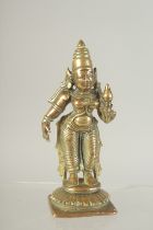 A SMALL INDIAN BRONZE DEITY, 9.5cm high.