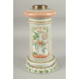 A CHINESE FAMILLE VERTE PORCELAIN LAMP, painted with panels of figures and birds, 31cm high (af).