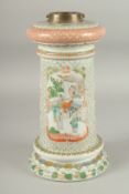 A CHINESE FAMILLE VERTE PORCELAIN LAMP, painted with panels of figures and birds, 31cm high (af).