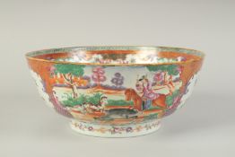 A CHINESE EXPORT FAMILLE ROSE PORCELAIN HUNTING SCENE PUNCH BOWL, painted with European figures on