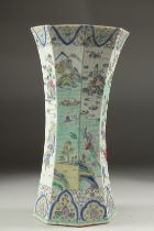 A 19TH CENTURY FAMILLE VERTE PORCELAIN OCTAGONAL VASE, painted with various figures and landscape