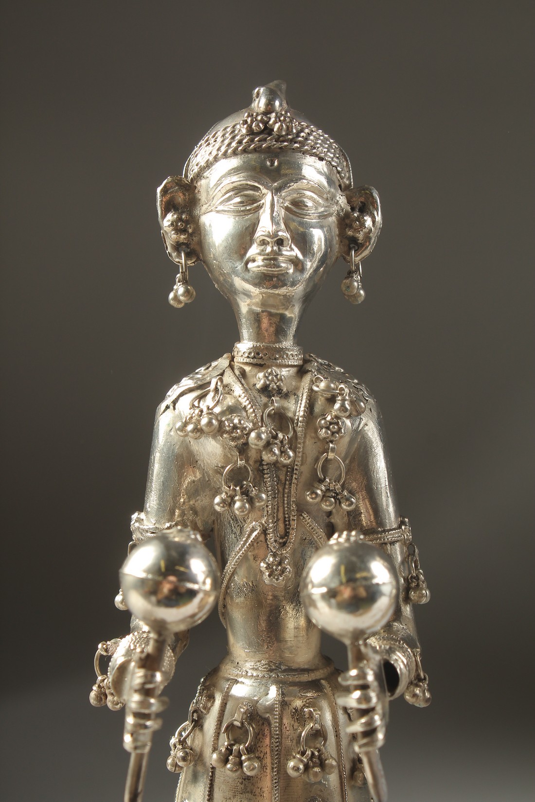 A FINE PAIR OF 19TH CENTURY INDIAN SILVER FIGURES OF MUSICIANS, 30cm high. - Image 4 of 11
