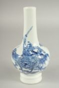 A FINE CHINESE BLUE AND WHITE PORCELAIN BOTTLE VASE, painted with an immortal riding a dragon-like