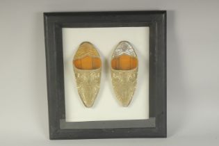 A PAIR OF OTTOMAN TURKISH SLIPPERS, framed and glazed.