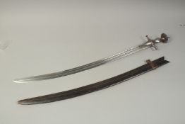A 19TH CENTURY INDIAN TULWAR, with fine blade - probably Damascus, inscribed to the blade and marked