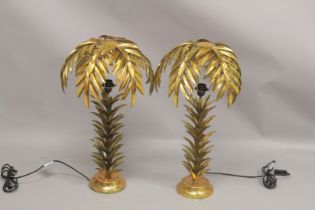 A PAIR OF GILT METAL PALM TREE TABLE LAMPS. 2ft high.