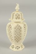 A LATE 19TH CENTURY LEEDS CREAMWARE VASE AND COVER, the body having alternating pierced panels