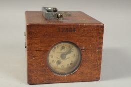 A RARE PLASSCHAERT OAK CASED PIGEON RACING CLOCK TIMER. No. 37864 with carrying handle. 7.25ins