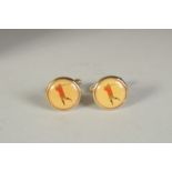 A PAIR OF ARNOLD PALMER COLLECTION GOLF CUFF LINKS.