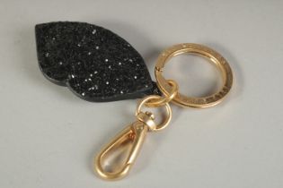 A LULU GUINNESS KEY RING in original box.