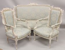 A GOOD WHITE PAINTED THREE PIECE FRENCH SOFA SET with padded back and seat, comprising: sofa, 5ft