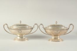 A GOOD PAIR OF GEORGE III SILVER OVAL SAUCE TUREENS AND COVERS with loop handles, beaded edge and