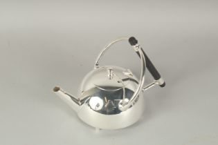 A CHRISTOPHER DRESSER STYLE SILVER PLATED CIRCULAR TEA POT.