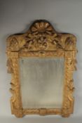 A GOOD LARGE 18TH CENTURY FRENCH GILDED WOOD UPRIGHT MIRROR with ribbons and other motifs. 3ft high,