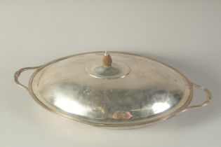 A GEORGE III SILVER OVAL TWO HANDLED TUREEN AND COVER, London 1797, Maker E. E. Wall, 30ozs.