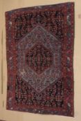 A GOOD PERSIAN RUG pale blue ground, central panel with all over stylised design. 6ft 5ins x 4ft