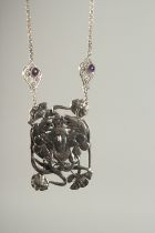 A SILVER NOUVEAU STYLE GIRL NECKLACE.