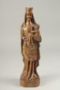 AN 18TH CENTURY CARVED WOOD MADONNA AND CHILD. 12ins high.