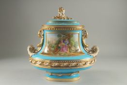 A SUPERB SEVRES DESIGN OVAL TUREEN AND COVER with pale blue ground edged in gilt, the sides with