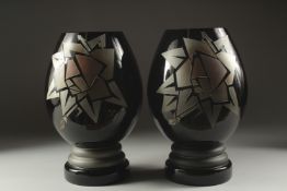 A LARGE PAIR OF ART DECO COLUMN GLASS VASES. 12ins high.