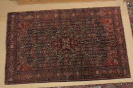 A GOOD PERSIAN PART SILK RUG blue and red ground with stylised floral design. 6ft 11ins x 4ft 4ins.