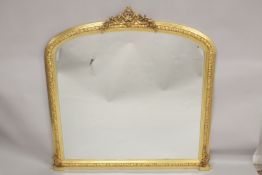 A GOOD LARGE GILTWOOD OVERMANTLE MIRROR with shell finials with garlands. 5ft 3ins high, 6ft wide.