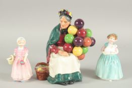 THE ROYAL DOUTON FIGURINES "The Old Balloon Lady" HN 1315, "Tinkerbell" HN 1677 and "Bunny" HN 2214.