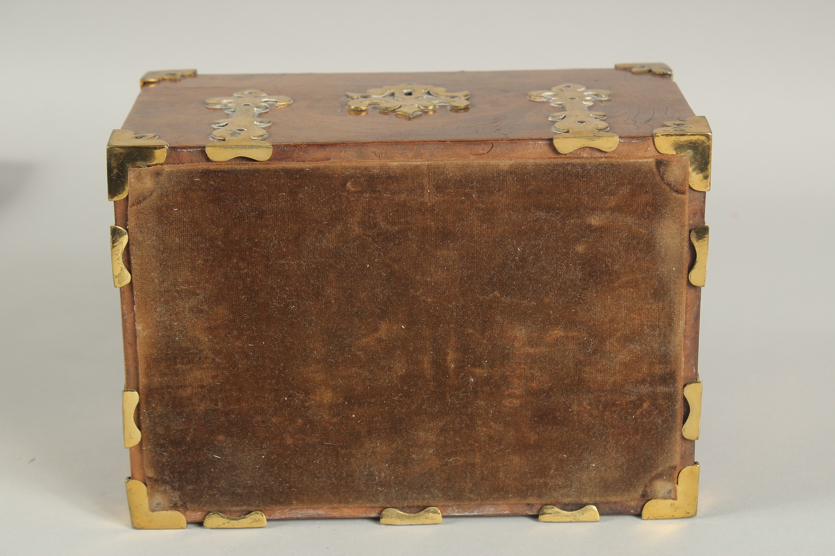 A GOOD 19TH CENTURY FIGURED WALNUT BRASS BOUND CASKET with velvet interior. 8ins long. - Image 3 of 3