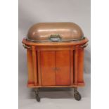 A GOOD HOTEL METAL TROLLEY with rising folding copper cover, fitted interior over a pair of panel