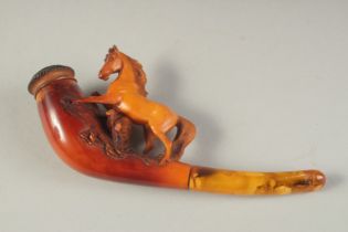 A GOOD MEERSCHAUM CHEROOT HOLDER CARVED WITH A HORSE. 8cm long, 5cm deep with an amber mouth piece.