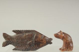 A CHINESE CARVED WOOD CARP 5ins long, a BLACK FOREST BEAR.